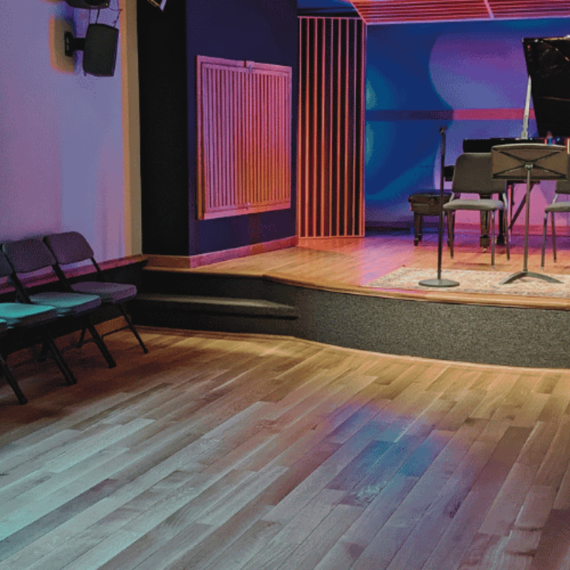 Real Solid Wood Floor in Performance Studio over Concrete