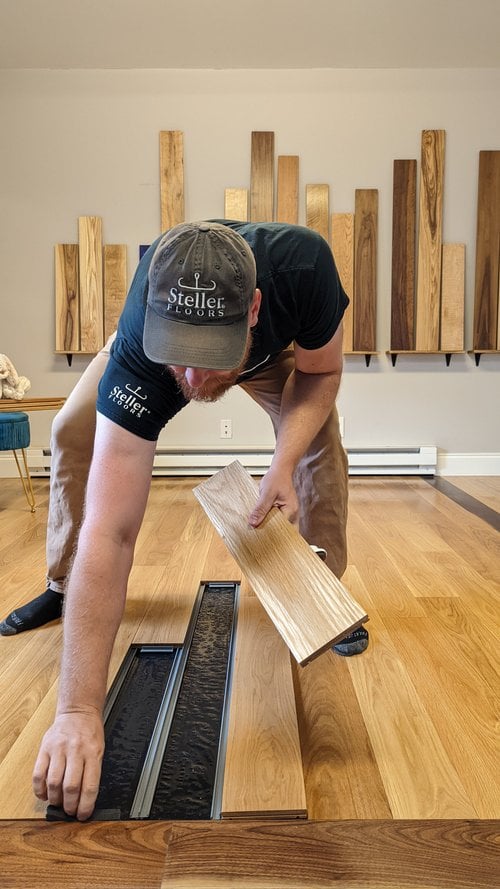person assembles white oak tempe steller floor person assembles white oak tempe steller floor