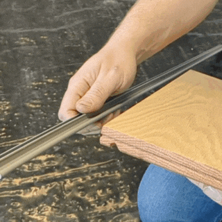 Demonstrating how to attach a Steller Clip to a Steller Wood Plank